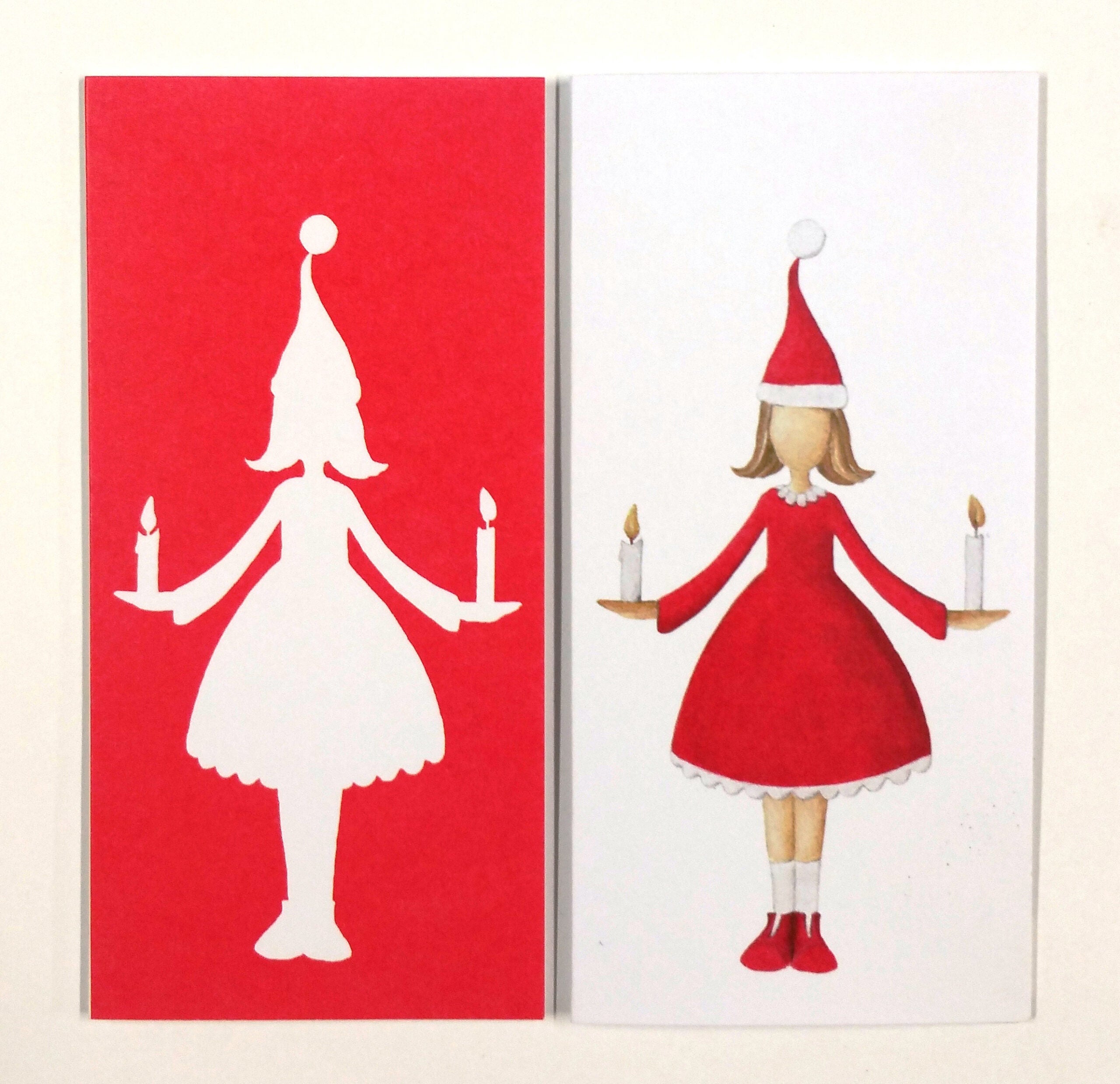 Kertaljós og klæðin rauð